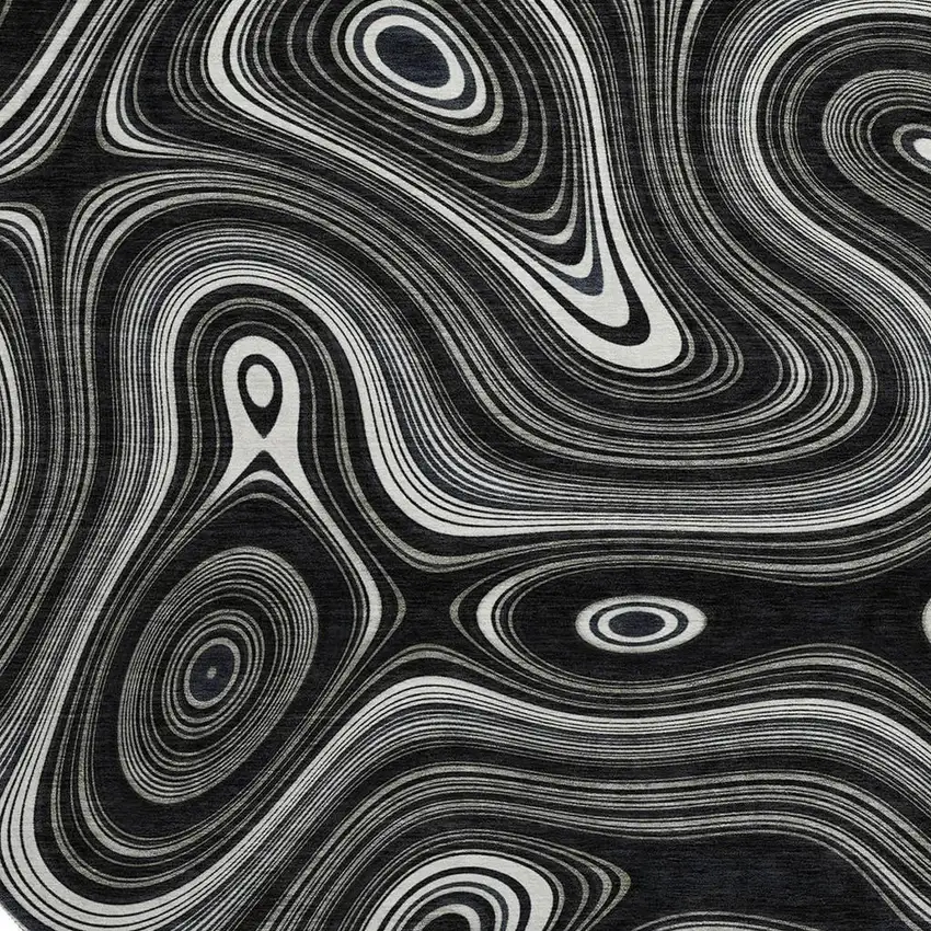 8' Black And Ivory Geometric Washable Round Rug With UV Protection Photo 4