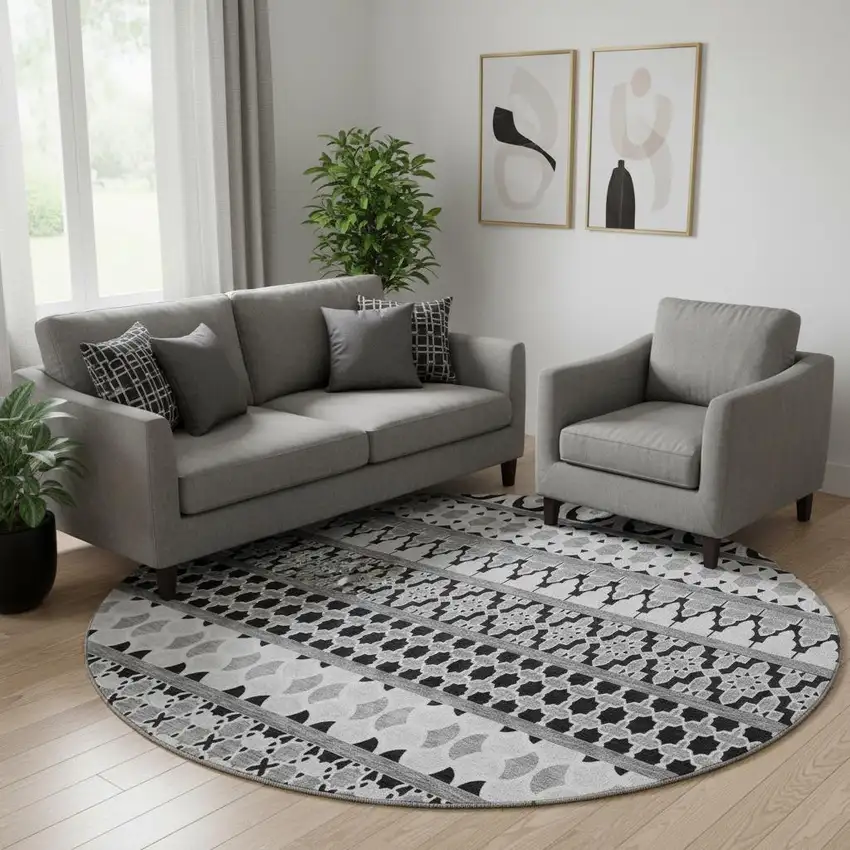 8' Black And Ivory Ikat Washable Round Rug With UV Protection Photo 1