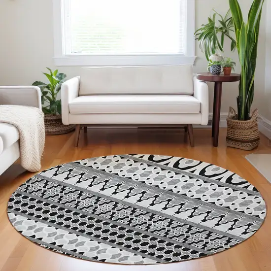 8' Black And Ivory Ikat Washable Round Rug With UV Protection Photo 5
