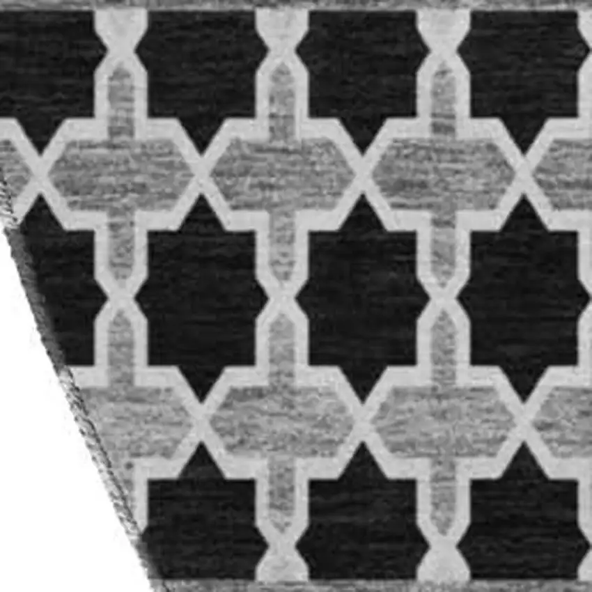 8' Black And Ivory Ikat Washable Round Rug With UV Protection Photo 3