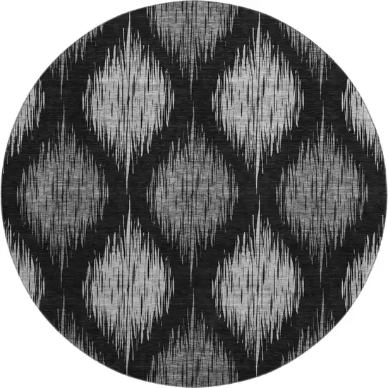 8' Black And Ivory Ikat Washable Round Rug With UV Protection Photo 1
