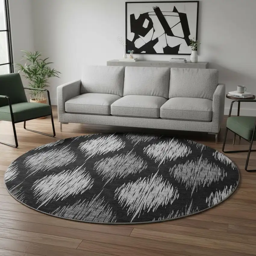 8' Black And Ivory Ikat Washable Round Rug With UV Protection Photo 2
