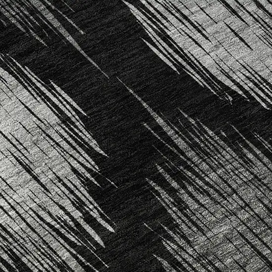 8' Black And Ivory Ikat Washable Round Rug With UV Protection Photo 9