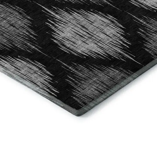 8' Black And Ivory Ikat Washable Round Rug With UV Protection Photo 7