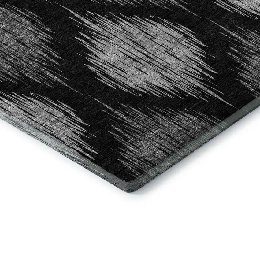 8' Black And Ivory Ikat Washable Round Rug With UV Protection Photo 7