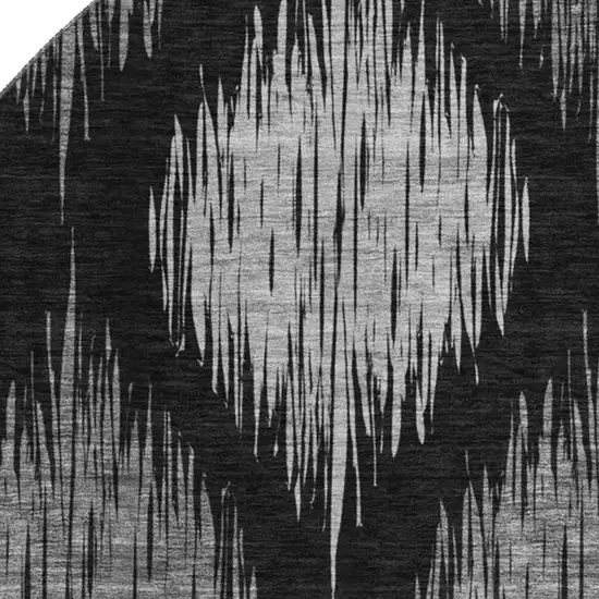 8' Black And Ivory Ikat Washable Round Rug With UV Protection Photo 3