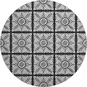 Photo of 8' Black And Ivory Medallion Washable Round Rug With UV Protection