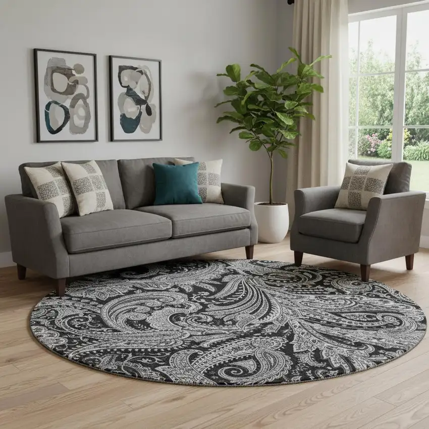 8' Black And Ivory Paisley Washable Round Rug With UV Protection Photo 1