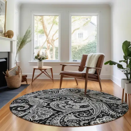 8' Black And Ivory Paisley Washable Round Rug With UV Protection Photo 5