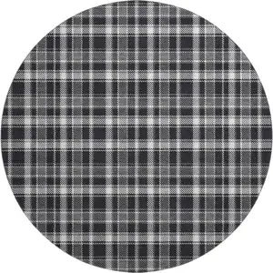 Photo of 8' Black And Ivory Plaid Washable Round Rug With UV Protection