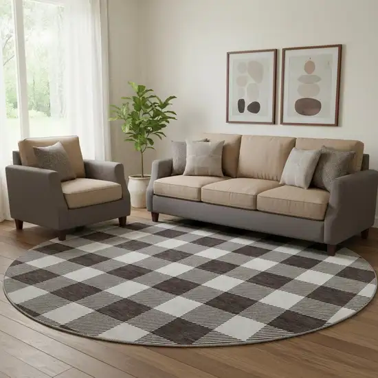 8' Black And Ivory Plaid Washable Round Rug With UV Protection Photo 1