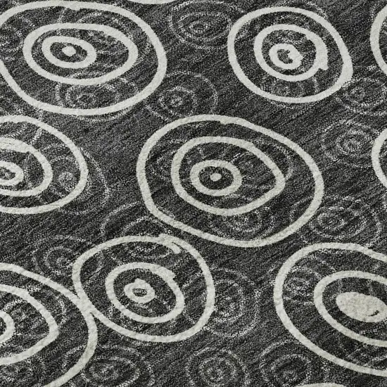 8' Black And Ivory Polka Dot Washable Round Rug With UV Protection Photo 9