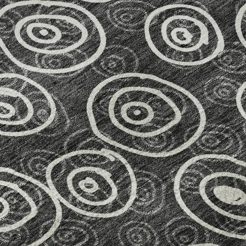 8' Black And Ivory Polka Dot Washable Round Rug With UV Protection Photo 9