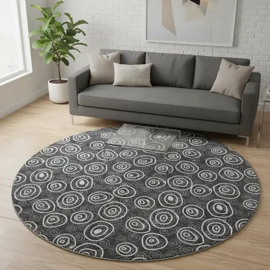 8' Black And Ivory Polka Dot Washable Round Rug With UV Protection Photo 2