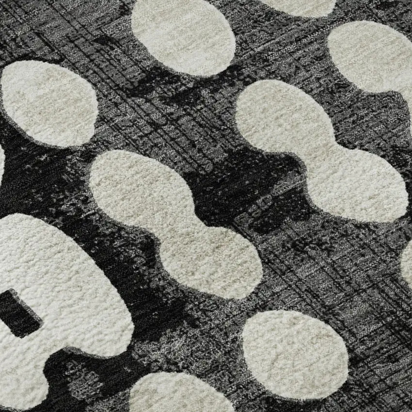 8' Black And Ivory Polka Dot Washable Round Rug With UV Protection Photo 9