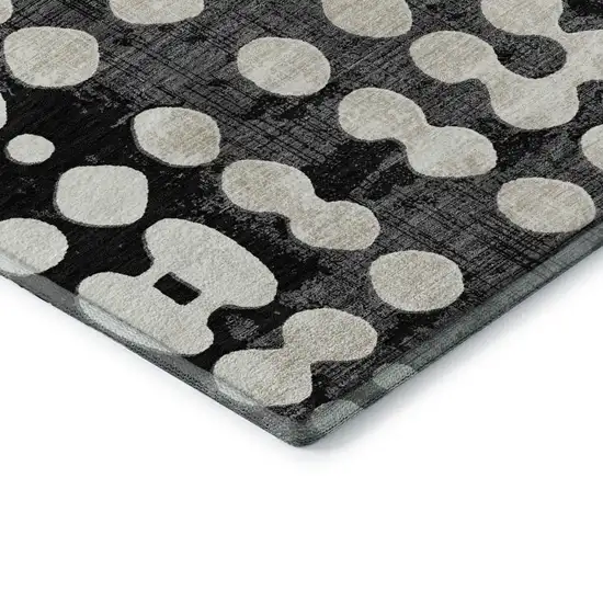 8' Black And Ivory Polka Dot Washable Round Rug With UV Protection Photo 7