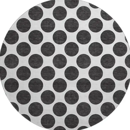 8' Black And Ivory Polka Dot Washable Round Rug With UV Protection Photo 3