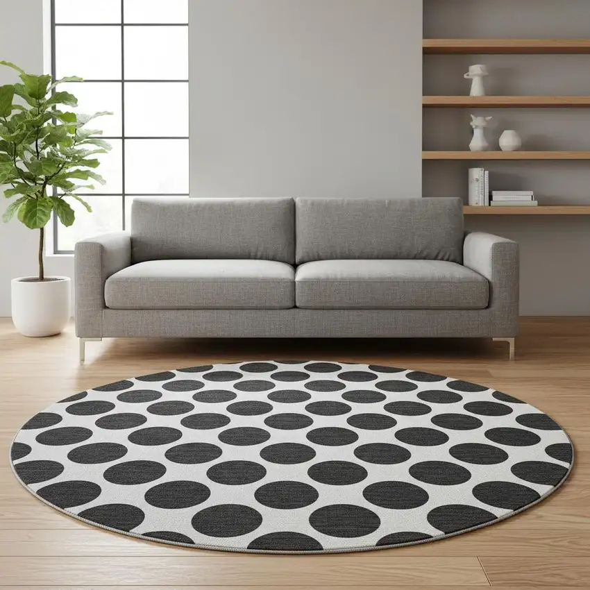 8' Black And Ivory Polka Dot Washable Round Rug With UV Protection Photo 2