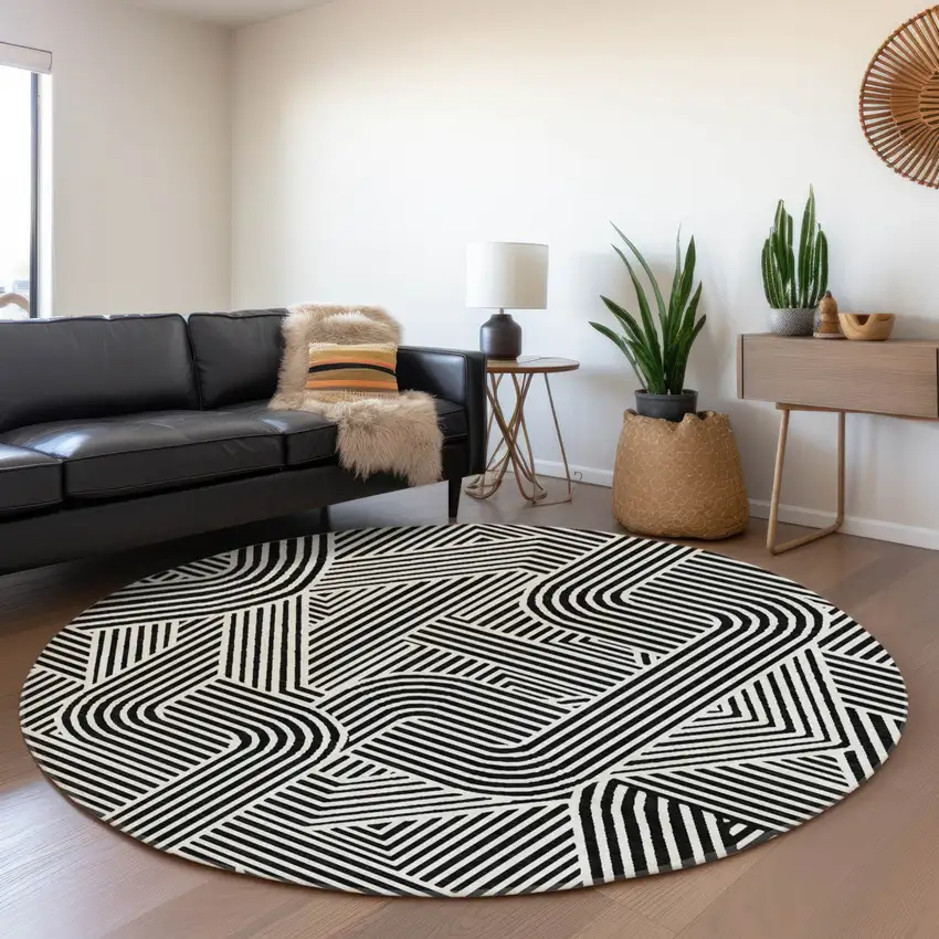 8' Black And Ivory Round Abstract Washable Indoor Outdoor Area Rug Photo 7