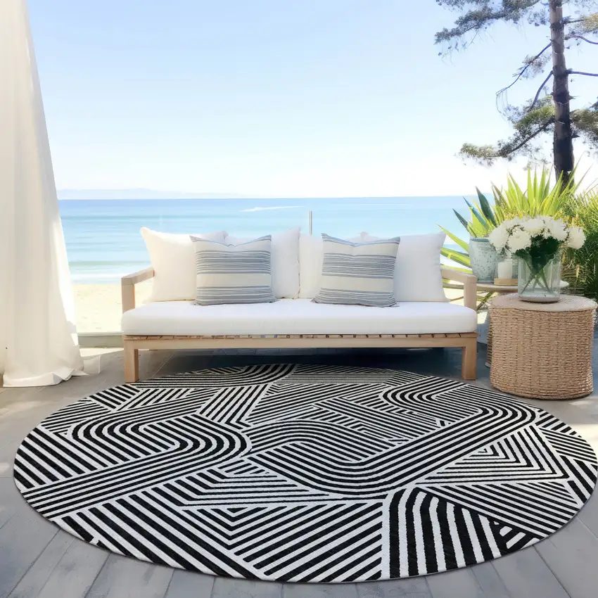 8' Black And Ivory Round Abstract Washable Indoor Outdoor Area Rug Photo 6