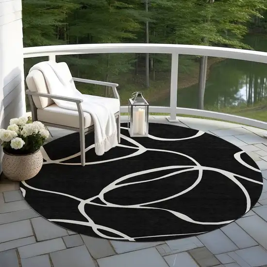 8' Black And Ivory Round Abstract Washable Indoor Outdoor Area Rug Photo 6