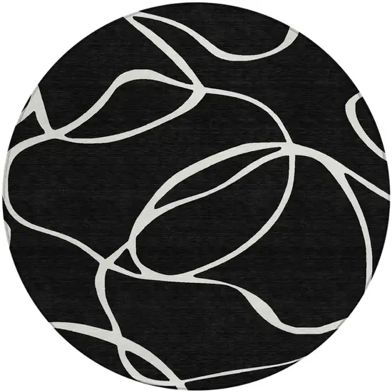 8' Black And Ivory Round Abstract Washable Indoor Outdoor Area Rug Photo 2