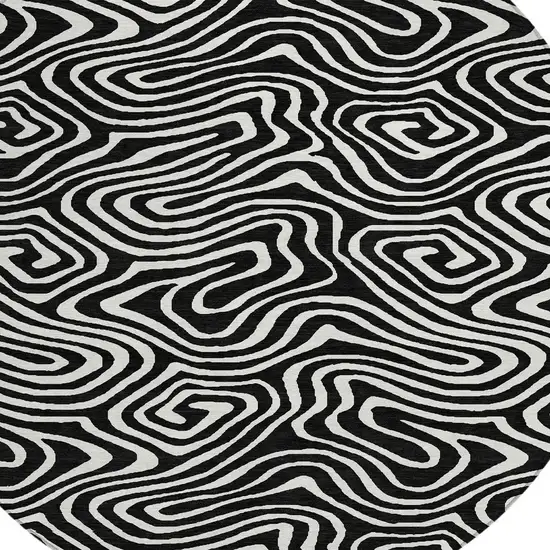 8' Black And Ivory Round Abstract Washable Indoor Outdoor Area Rug Photo 4