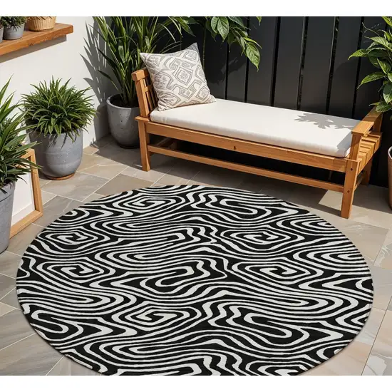 8' Black And Ivory Round Abstract Washable Indoor Outdoor Area Rug Photo 1