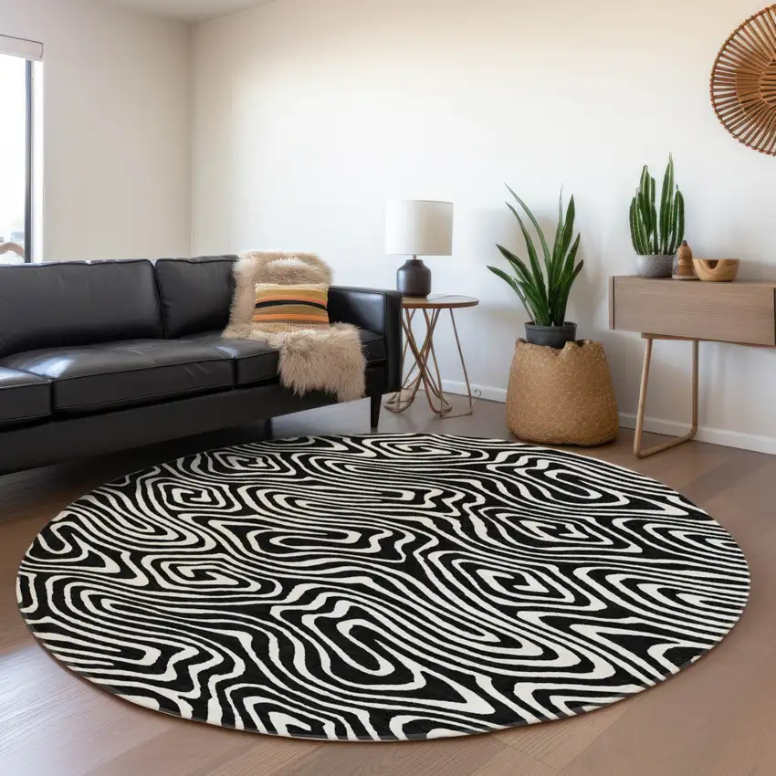 8' Black And Ivory Round Abstract Washable Indoor Outdoor Area Rug Photo 7