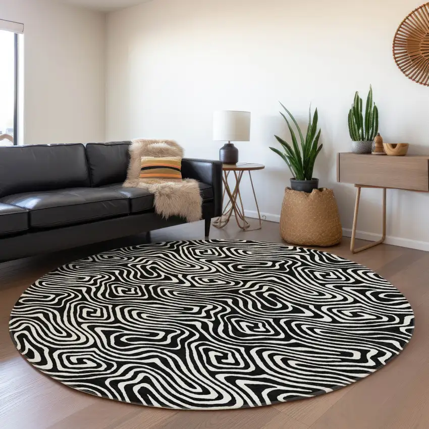 8' Black And Ivory Round Abstract Washable Indoor Outdoor Area Rug Photo 7