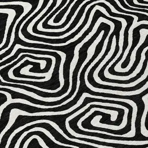 Photo of 8' Black And Ivory Round Abstract Washable Indoor Outdoor Area Rug
