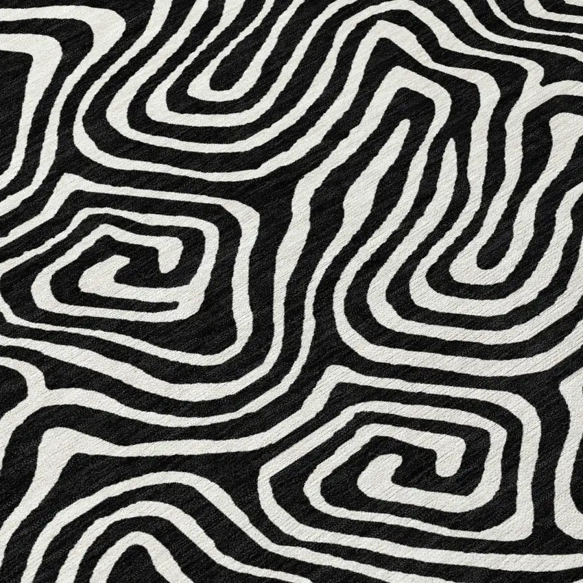 8' Black And Ivory Round Abstract Washable Indoor Outdoor Area Rug Photo 8