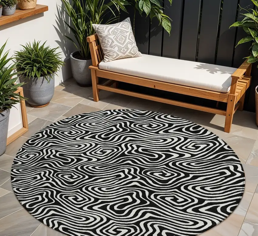 8' Black And Ivory Round Abstract Washable Indoor Outdoor Area Rug Photo 1