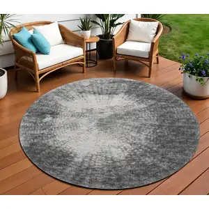 Photo of 8' Black And Ivory Round Abstract Washable Indoor Outdoor Area Rug
