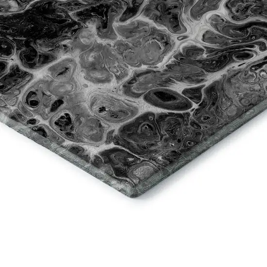 8' Black And Ivory Round Abstract Washable Indoor Outdoor Area Rug Photo 5