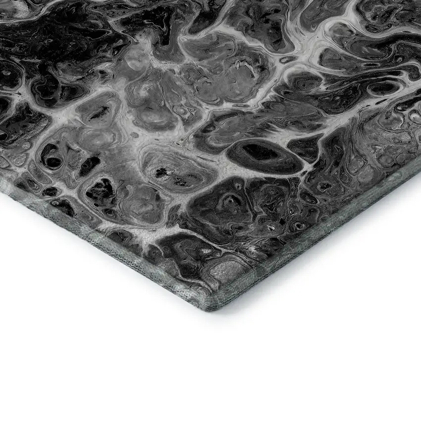 8' Black And Ivory Round Abstract Washable Indoor Outdoor Area Rug Photo 5