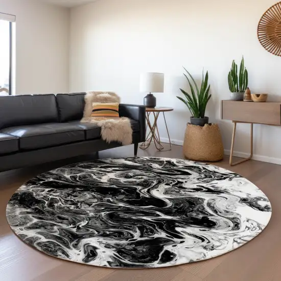 8' Black And Ivory Round Abstract Washable Indoor Outdoor Area Rug Photo 6
