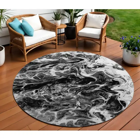 8' Black And Ivory Round Abstract Washable Indoor Outdoor Area Rug Photo 1