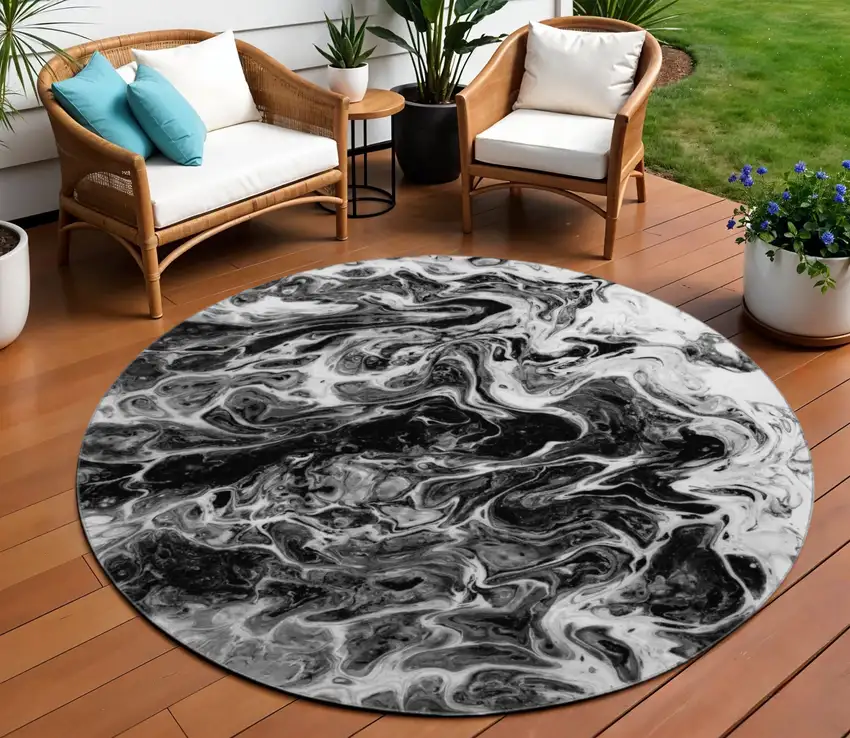 8' Black And Ivory Round Abstract Washable Indoor Outdoor Area Rug Photo 1