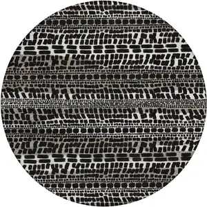 Photo of 8' Black And Ivory Round Abstract Washable Indoor Outdoor Area Rug