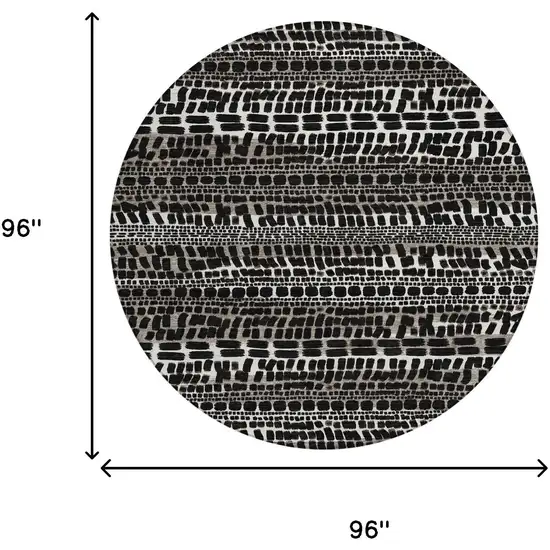 8' Black And Ivory Round Abstract Washable Indoor Outdoor Area Rug Photo 8