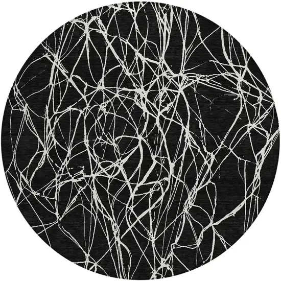 8' Black And Ivory Round Abstract Washable Indoor Outdoor Area Rug Photo 2