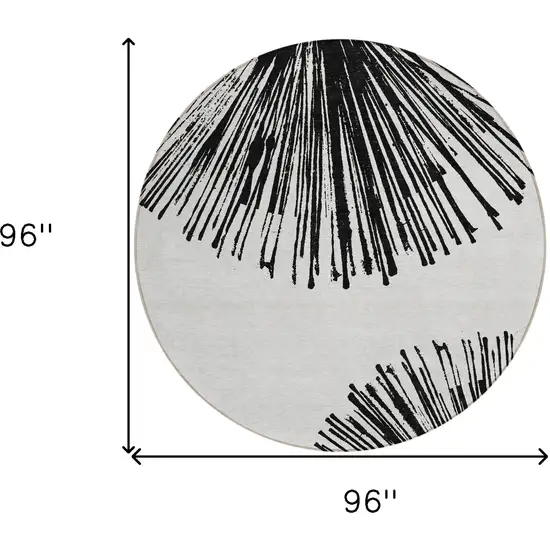 8' Black And Ivory Round Abstract Washable Indoor Outdoor Area Rug Photo 9