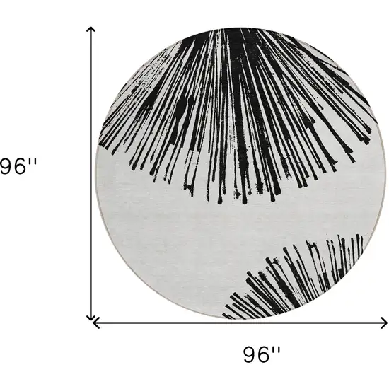 8' Black And Ivory Round Abstract Washable Indoor Outdoor Area Rug Photo 9