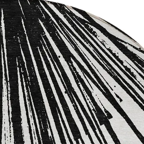 8' Black And Ivory Round Abstract Washable Indoor Outdoor Area Rug Photo 5
