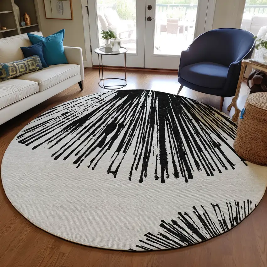 8' Black And Ivory Round Abstract Washable Indoor Outdoor Area Rug Photo 8