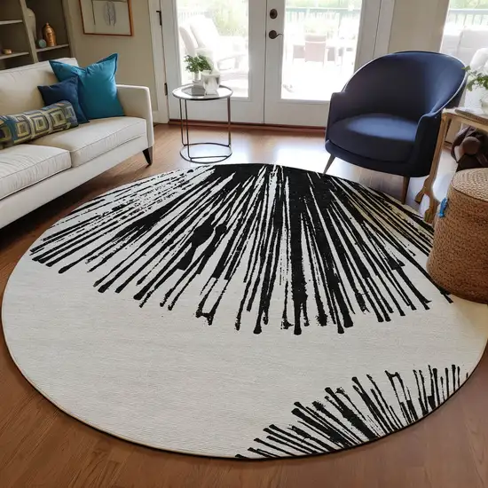 8' Black And Ivory Round Abstract Washable Indoor Outdoor Area Rug Photo 8