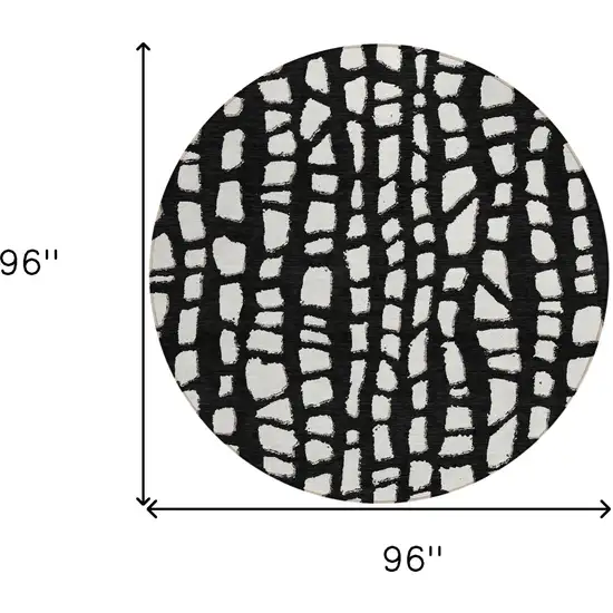 8' Black And Ivory Round Abstract Washable Indoor Outdoor Area Rug Photo 8