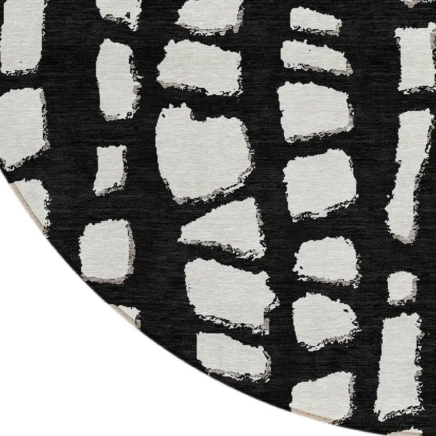 8' Black And Ivory Round Abstract Washable Indoor Outdoor Area Rug Photo 5
