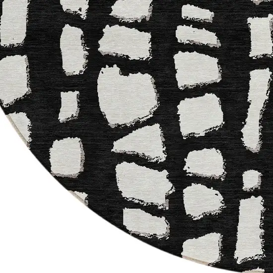 8' Black And Ivory Round Abstract Washable Indoor Outdoor Area Rug Photo 5